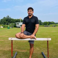 Day 50 of my 120 Hard Fitness Challenge. Using a hurdle for stretching after a tough workout. Flexibility is as important as strength.