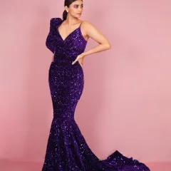 Actress Daisy Shah in a stunning purple sequin gown. This image demonstrates my studio lighting technique to make the fabric sparkle and create a look that's ready for a magazine cover or red carpet feature.