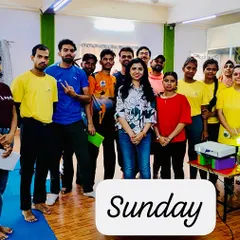 A group photo with the enthusiastic yoga trainers after a successful training session. Collaborating with other wellness professionals helps create a stronger, healthier community.