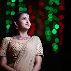 A stunning reception look for my bride. The bokeh lights in the background make her glow even more, highlighting the soft glam makeup and diamond jewelry.