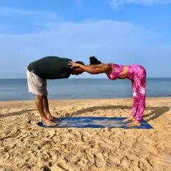 This partner forward fold creates a wonderful stretch for the spine and shoulders. It's a simple yet effective pose that encourages mutual support and alignment as we breathe and move together.