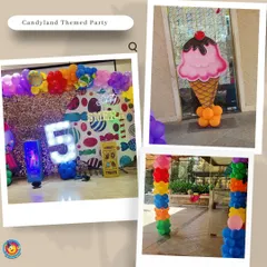 This Candyland themed party for a 5th birthday was a sweet escape. The decor included a backdrop of colorful candies, a giant ice cream cone balloon sculpture, and rainbow balloon columns.
