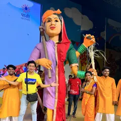 Standing proudly with the giant Bali Raja puppet, which symbolizes the victory of the farmer's movement. Creating these massive characters for Aamir Khan's Paani Foundation was a fulfilling project that blended art with a powerful social message.