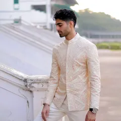 A closer look at the delicate threadwork on Siddhant's Roka bandhgala. The subtle pattern adds a layer of sophistication without overwhelming the look.