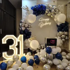 Another view of the sophisticated navy and silver balloon arrangement for the 31st birthday celebration.