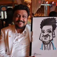 Live caricatures aren't just for personal parties. I bring a unique and fun energy to corporate get-togethers, helping employees relax and connect. This was a great night sketching at a company's annual event in Pune.