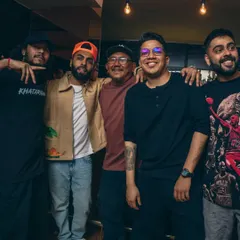 Chilling with the crew, including UK artist Raxstar. The hip hop scene is a community, and I'm proud to be an OG who collaborates with and supports other artists.