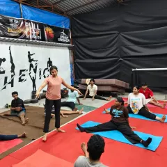 Another angle of our group flexibility class, showing the focus and dedication of our members to improving their mobility.