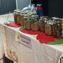 A stall from Nutrilicious Gourmet, offering a range of healthy, homemade snacks in glass jars. I love supporting local brands that focus on clean and nutritious food for the family.