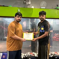 Recognizing the hard work of another student. Earning a certificate here is not easy, and it's always a proud moment.