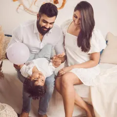 Playful moments are the best moments. We encourage tickle fights and games to bring out the most natural smiles during our family photoshoots.