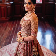 A full-length portrait of my bride in her stunning Rimple and Harpreet lehenga. The makeup was designed to complement the grandeur of the outfit, with a focus on a regal and poised finish for her destination wedding.