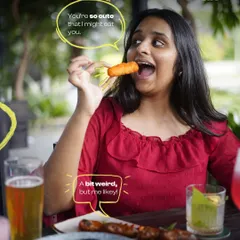 The fun and playful banter between friends over a plate of appetizers is the kind of energy I love to see. It’s all about being yourself and having a good time.