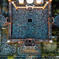 This top-down aerial view of Jama Masjid during Eid prayers captures the incredible density and beautiful, chaotic symmetry of thousands of worshippers. It’s a perspective that reveals a pattern of devotion invisible from the ground, showcasing my ability to capture the scale of massive events.