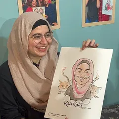 This guest was so happy with her portrait, which included her beloved cats. I love adding these personal details that make each drawing extra special.