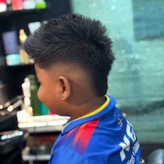 A side profile of Arya's mohawk. This style is popular with kids because it's fun, edgy, and looks great.