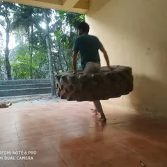 The tire carry is a test of total body strength and endurance. This exercise builds the powerful core and legs needed for Kyokushin stances and kicks.