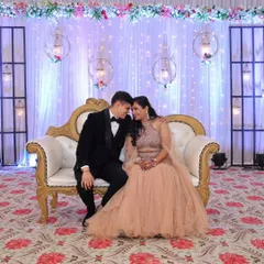 A romantic moment captured in my rental outfits. The peach fish-cut lehenga and black tuxedo create a timeless and elegant pair, perfect for any formal celebration.