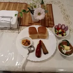 A simple and satisfying meal of pav bhaji, salad, and our stuffed chilli and mango pickles. This is comfort food for us.
