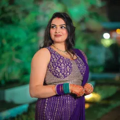 A candid shot of a guest enjoying the wedding festivities.