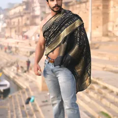 Embodying the energy of the city with Shiva in my soul. This portrait channels the raw, powerful vibe of Banaras, blending modern denim with a traditional 'Om Namah Shivaya' drape.