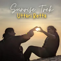 Making a heart against the sunrise at Uttari Betta. Our one day treks are perfect for creating beautiful memories with friends.