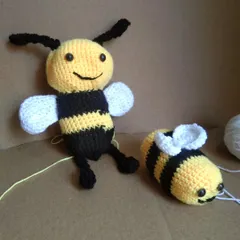 Meet my mommy and baby bee amigurumi set. These plush, smiling bees are great as toys or as companions for a bee-themed baby photoshoot.
