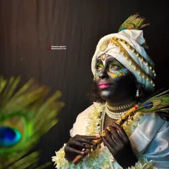In the realm of Vrindavan dreams. This final look captures the serene and divine essence of Krishna, complete with a peacock feather and flute.