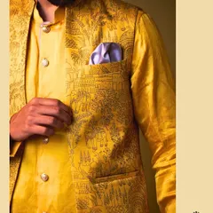 A closer look at the fine detailing on our Nehru jacket. The print depicts scenes of royal processions, adding a layer of artistry and history to the garment.