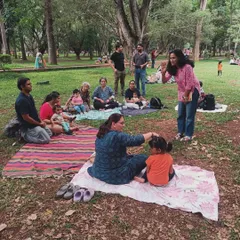I love these moments of connection. Here I am, waving to the group as a mother shares a quiet moment with her child. Our sessions are as much for the parents to relax and bond as they are for the kids to play.