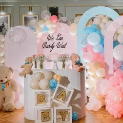 Our "We Can Barely Wait" teddy bear theme is a classic for a reason. This baby shower setup combines soft pink, blue, and cream balloons with adorable teddy bears and custom "BABY" blocks to create a sweet and welcoming atmosphere for the parents-to-be.