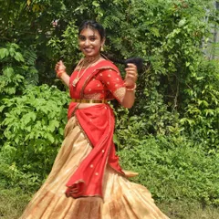 Another joyful shot of my client at her housewarming. The movement of the half-saree skirt is perfect for candid, happy pictures.
