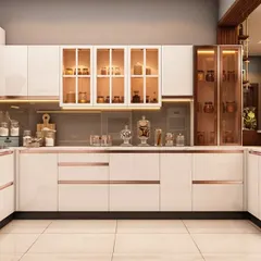 Our modular kitchens are where form meets function. This U-shaped kitchen design features high-gloss white cabinetry with rose gold accents, integrated glass display units, and a dedicated appliance tower, ensuring a seamless and elegant cooking experience.