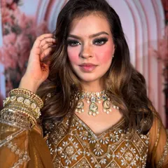 A close-up of this bold party look. The smokey eyes are the star of the show, balanced with a neutral lip and glowing skin.