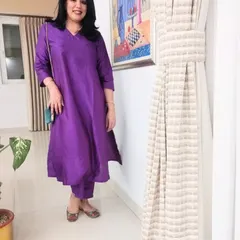 Don't be afraid of bold colours. This bright purple kurta set is fun and festive, perfect for an anniversary dinner with friends.