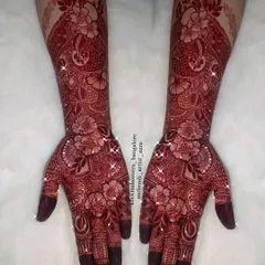 This is the beautiful, deep red stain you can achieve with my organic henna. This is the goal for every client.