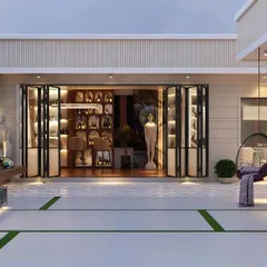 A preview of a sophisticated terrace on Golf Course Road, Gurugram. This view shows the seamless connection between an indoor bar area and the expansive outdoor patio, featuring elegant sculptures and a hanging chair for a touch of playful luxury.