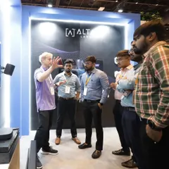 Engaging with industry experts and clients at events like the Smart Home Expo is key to our process. This image captures a moment of deep discussion about high-performance networking gear, reflecting our commitment to technical excellence.