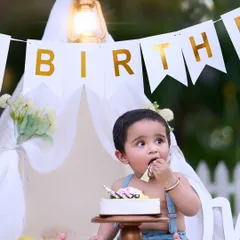 That first taste of birthday cake is a moment to remember. I set up beautiful backdrops like this teepee tent to create the perfect scene for your baby's cake smash adventure.
