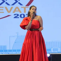 Dressed in red for the ROXX ELEVATE 2025 gala. I believe in not just hosting an event, but becoming a part of its story and vision.