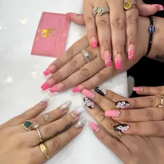 A showcase of different styles for a group of friends. Featuring pink ombré, black and pink with 3D florals, and white with silver glitter and rhinestone accents.