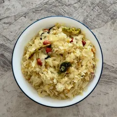 Our homemade Roasted Poha Chiwda, a light and healthy snack. Made with flattened rice, peanuts, and mild spices, it's the perfect guilt-free option for your 4 pm hunger pangs.