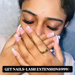 Another look at the fantastic results from my nail and lash package. Here, a client shows off her classic French manicure and full eyelash extensions.