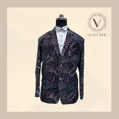 A full view of our one-of-a-kind designer blazer. The carnival-themed embroidery and perfect fit make this the ultimate statement piece for any party.