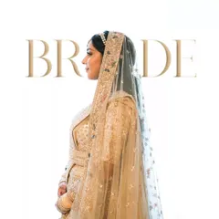A clean, high-key bridal portrait that emphasizes the bride's profile and the delicate details of her veil and jewelry. Timeless, elegant, and beautiful.