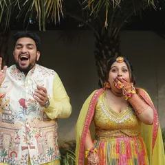 A candid and funny moment from a Haldi party. The couple's shocked and amused expressions are priceless.