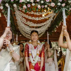 A bride's entrance should be nothing short of magical. For this South Indian wedding, we designed a breathtaking 'Phoolon ki Chadar' or floral canopy, creating a dreamy pathway for the bride as she was escorted by her loved ones.