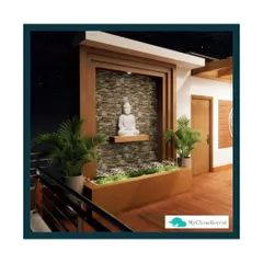 Even a small indoor or balcony space can become a Zen retreat. I designed this corner with a stone-textured wall, a white Buddha statue, and low-maintenance plants to bring a sense of calm and harmony indoors.