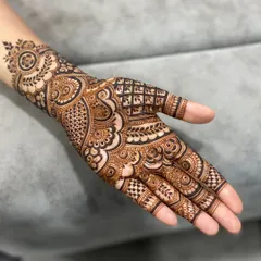 This design is a perfect example of Indo-Arabic style, with a mix of paisleys, checks, and flowing patterns.