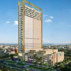 A rendering for the ATS Kabana high-rise project. This image shows the mixed-use building, with its commercial base and residential tower, situated within a bustling city environment to provide context.
